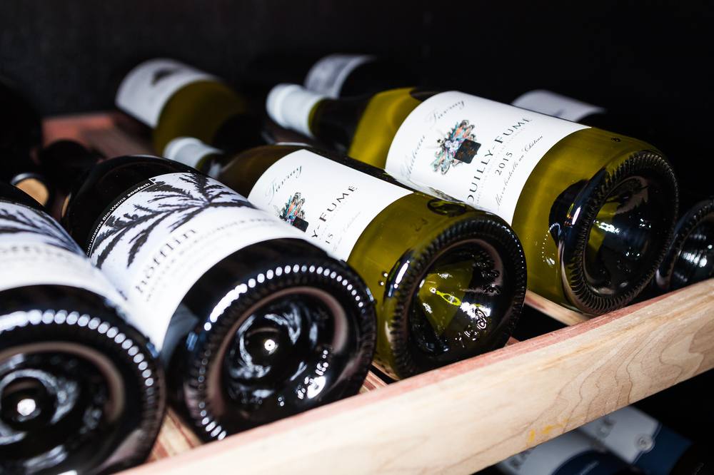 Bottles resting in the wine cellar at Graham's Kitchen